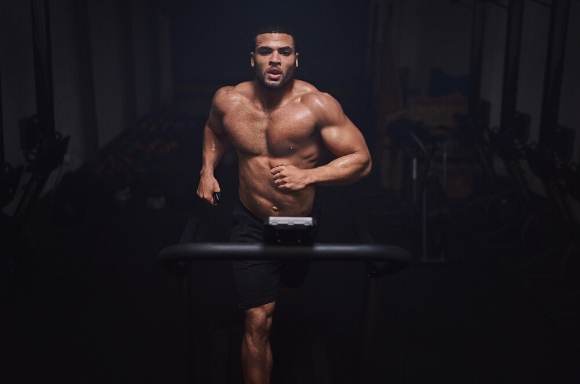 man running in forest